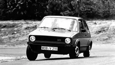 MK1 Golf GTI classic car taking a corner on a track at speed