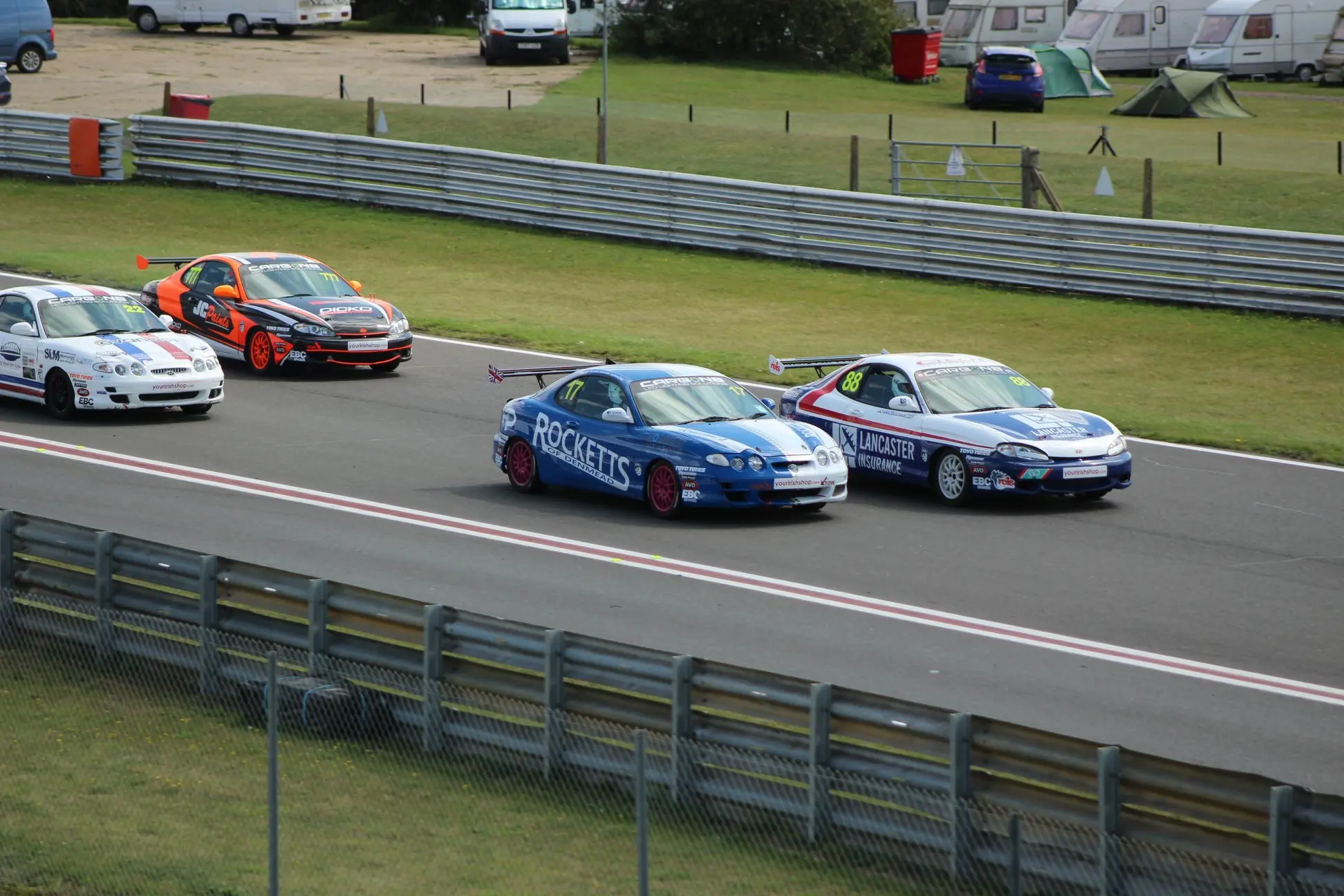 Alex eeking into the lead at the start of race one