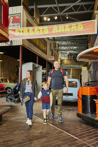 Family walking down street