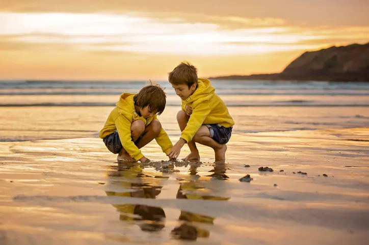 Kids playing on beach