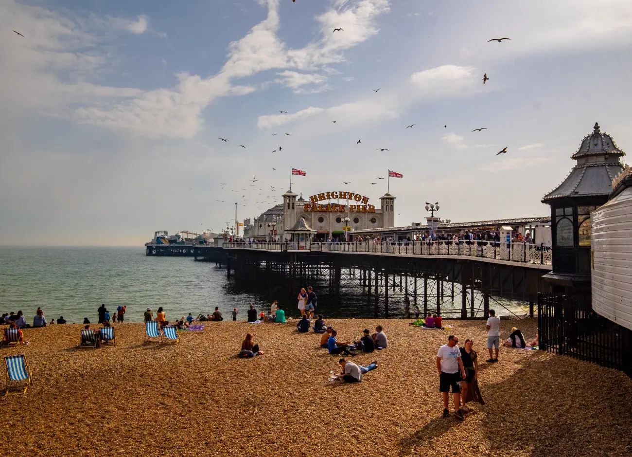 Brighton beach with the pier stretching out into the sea