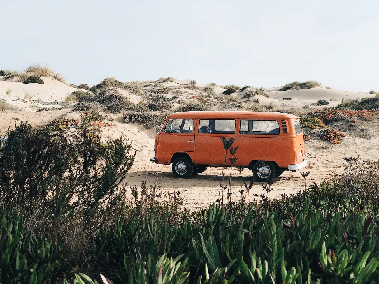 Campervan on sandy beach
