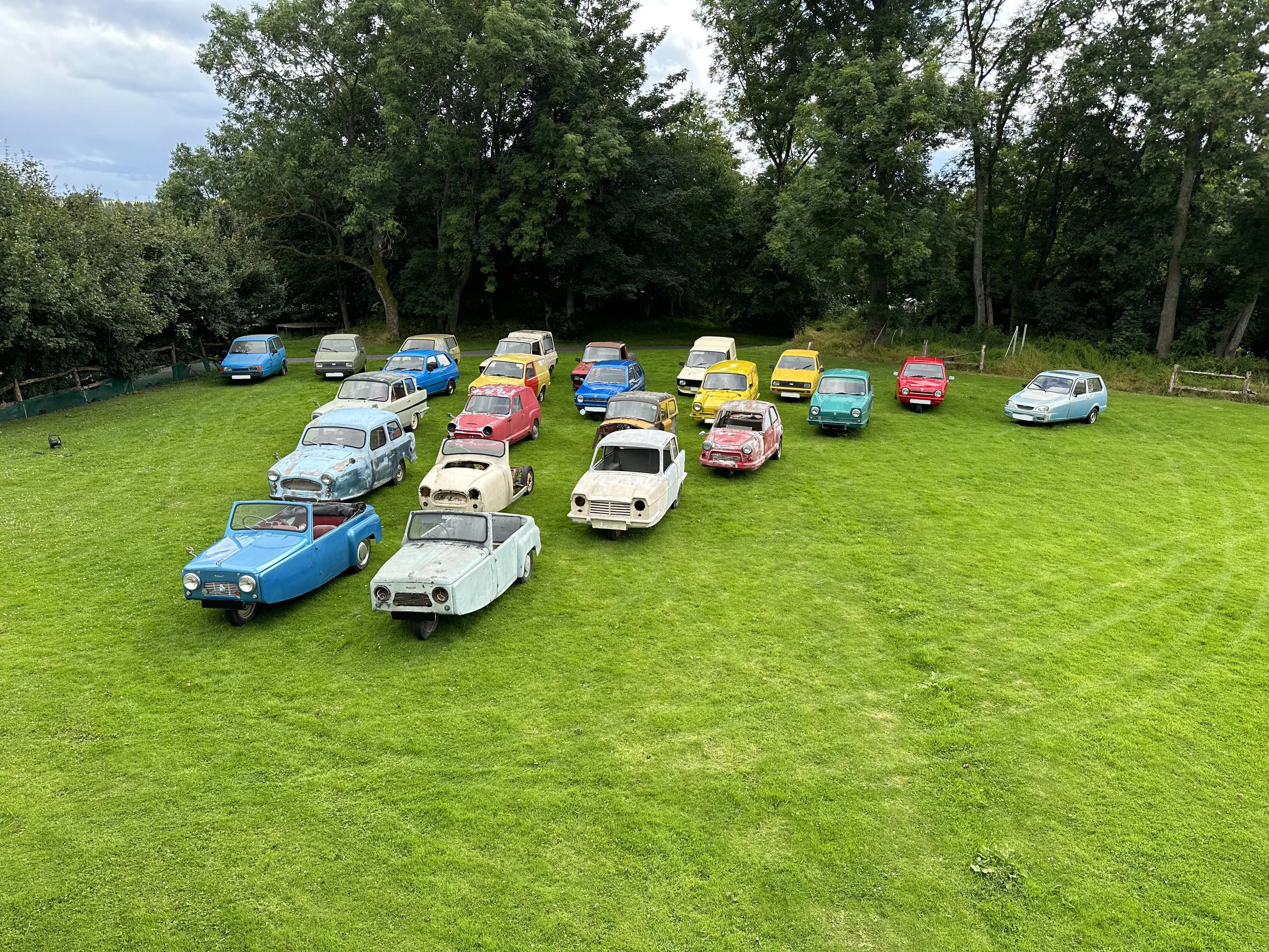 Cars in field