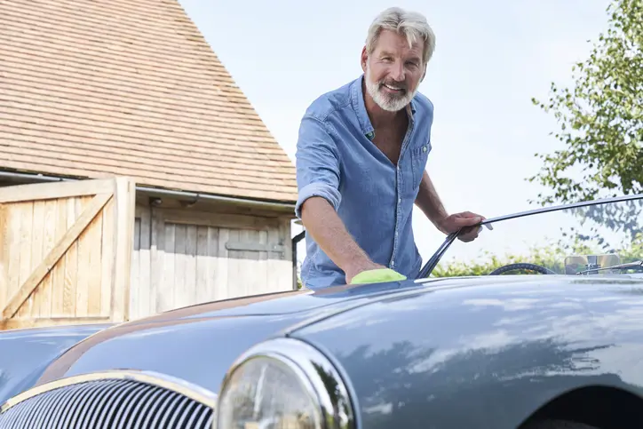 Owner taking care of his car