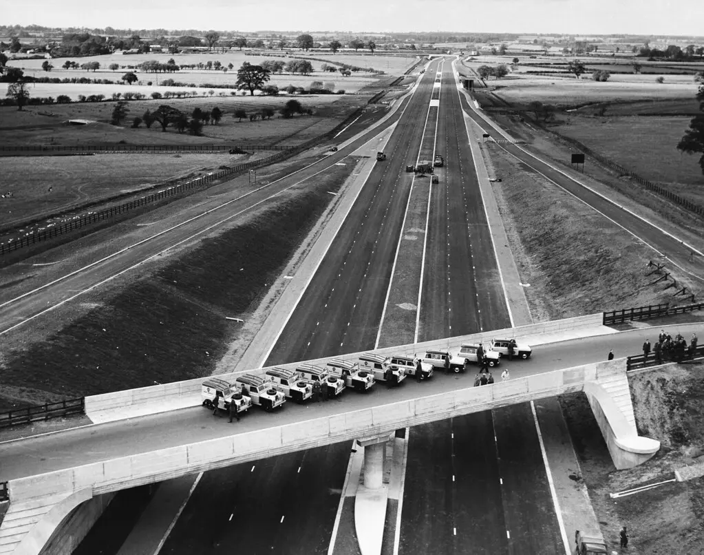 A picture over a bridge on the M1 lined with cars on the opening day