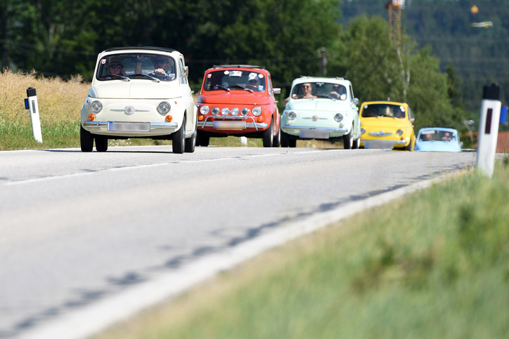 Classic cars in convoy