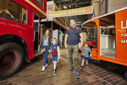 Family walking down street