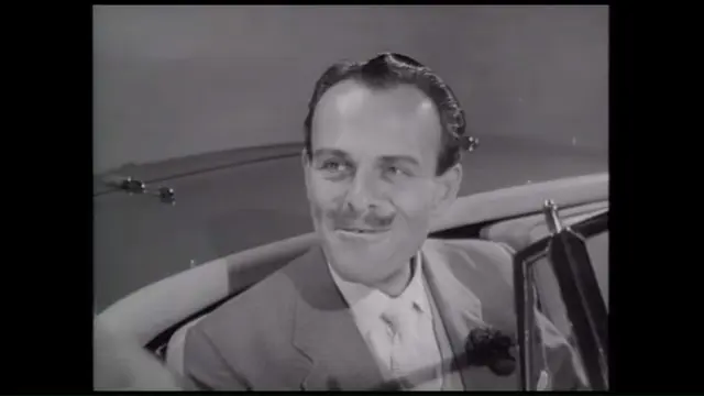 Famous man in classic car advert