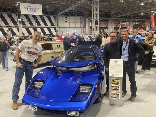 People with blue car