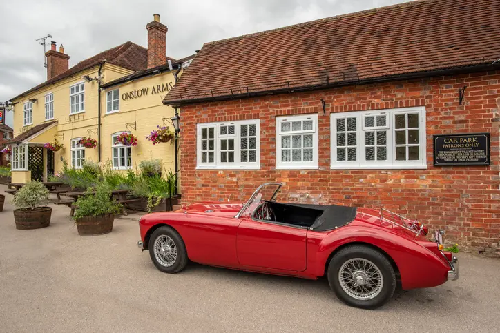 Red classic outside pub