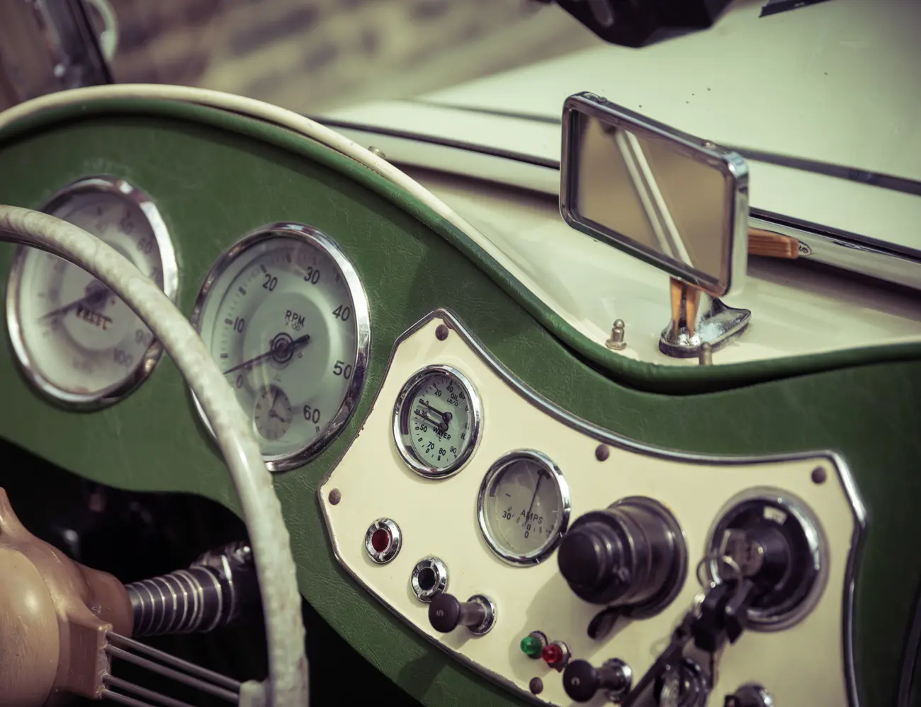 The dashboard of a vintage classic car