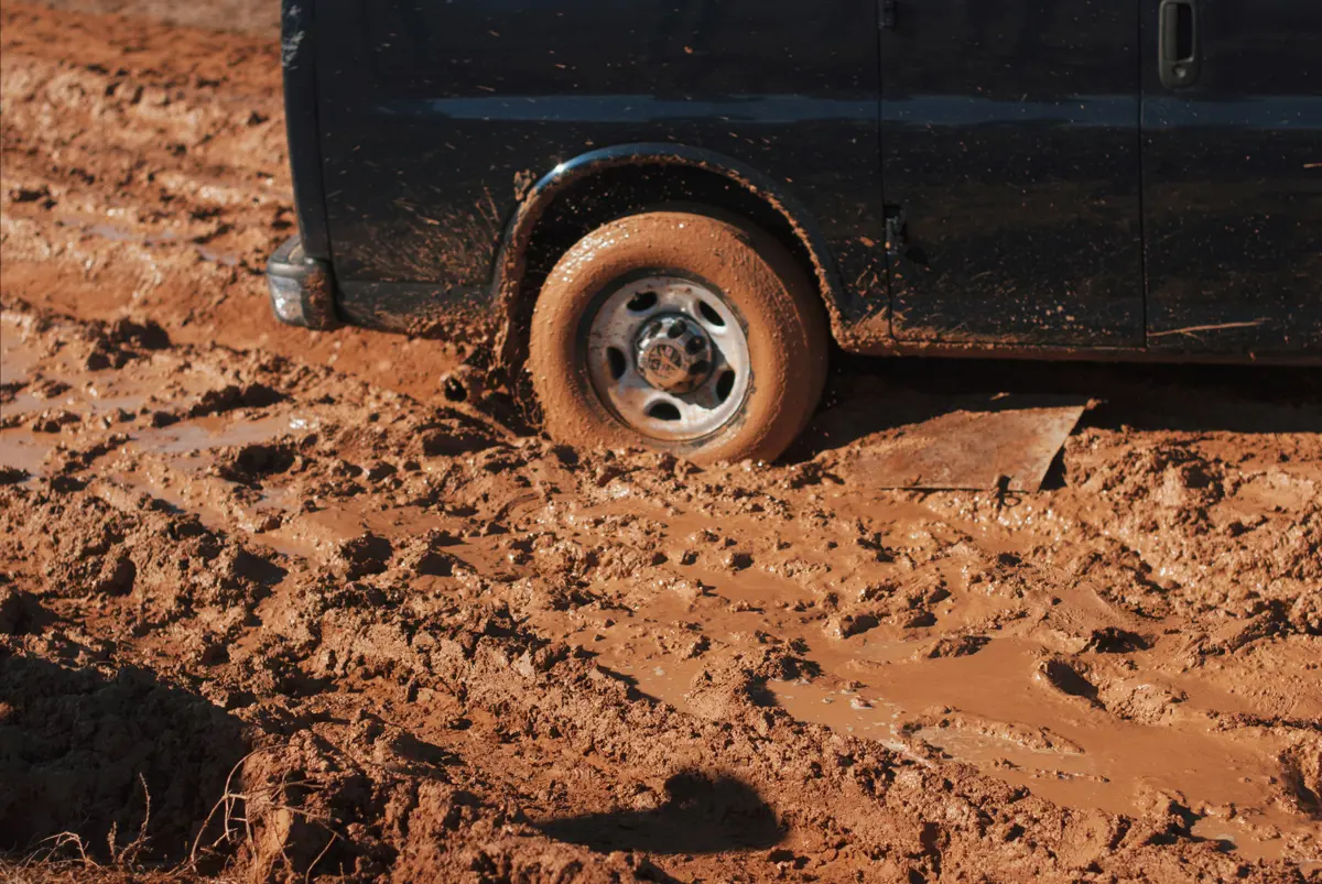 A motorhome stuck in a muddy field