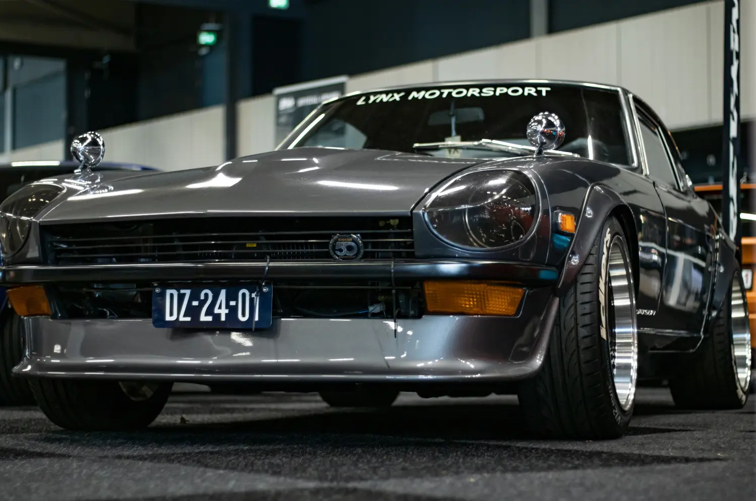 grey datsun 240z on display