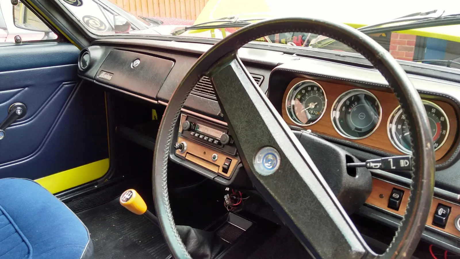 A view of the clean interior and dashboard of the Marina